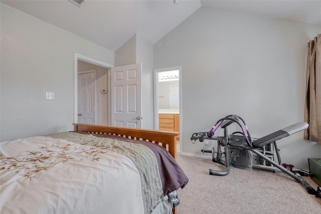 carpeted bedroom featuring high vaulted ceiling