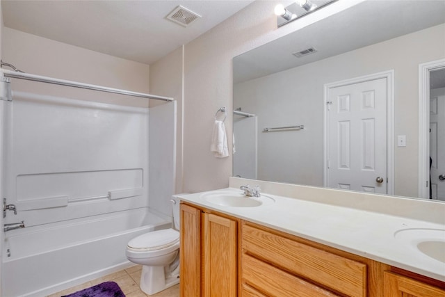 full bathroom with washtub / shower combination, tile flooring, dual vanity, and toilet