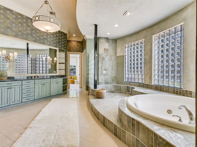 bathroom featuring shower with separate bathtub, a notable chandelier, vanity, and crown molding