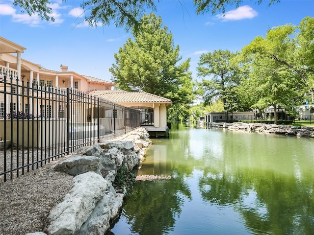 exterior space with a water view