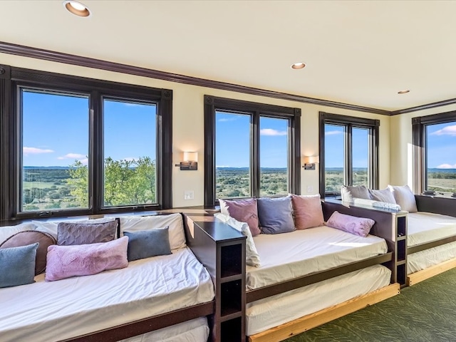 bedroom featuring hardwood / wood-style floors and ornamental molding