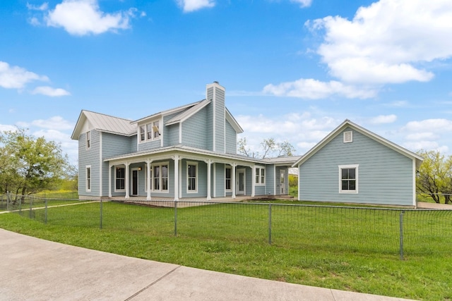 view of front of home featuring a front yard and covered porch