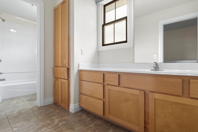 bathroom featuring vanity and shower / bath combination