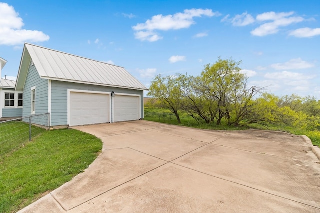 garage with a lawn