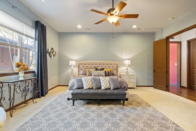 carpeted bedroom featuring ceiling fan