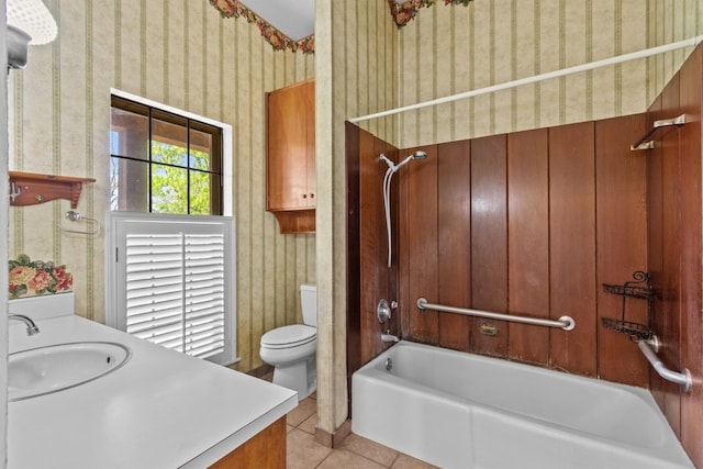 full bathroom featuring vanity, toilet, washtub / shower combination, and tile patterned floors