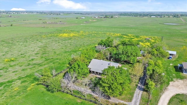 birds eye view of property featuring a rural view