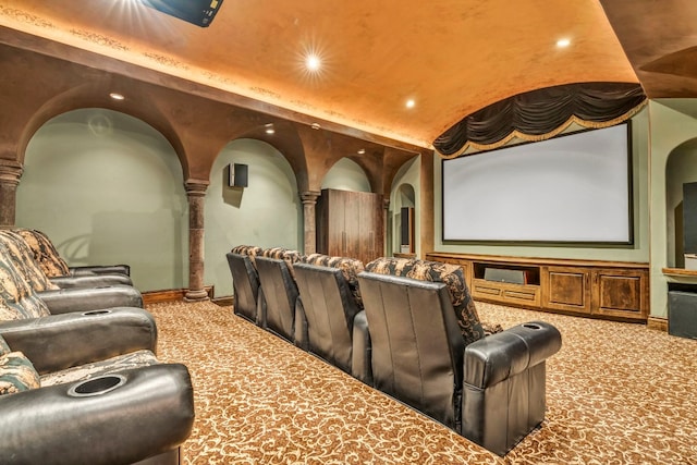 home theater room with ornate columns