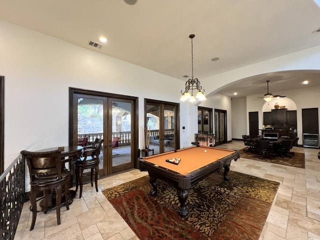 recreation room with ceiling fan, french doors, and billiards