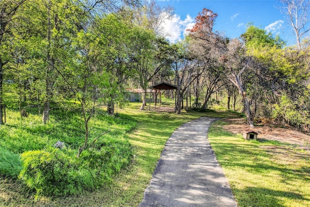 surrounding community featuring a lawn and a gazebo