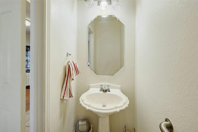 bathroom featuring hardwood / wood-style flooring