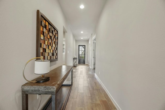 hallway featuring hardwood / wood-style flooring