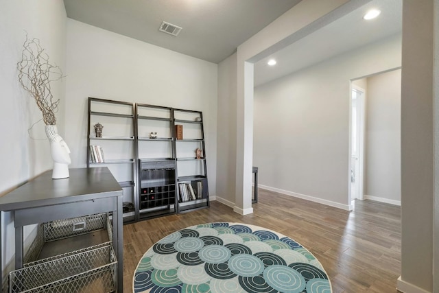 sitting room featuring dark hardwood / wood-style floors