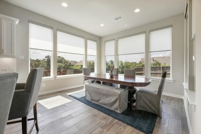 dining area with light hardwood / wood-style flooring