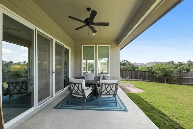 view of patio featuring ceiling fan