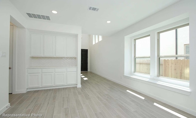 empty room featuring light hardwood / wood-style floors