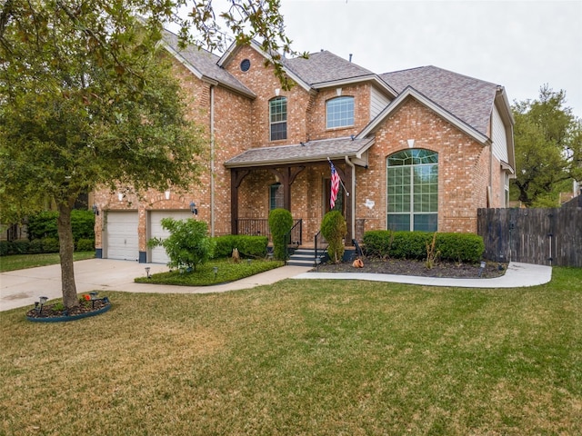 view of front of house featuring a front yard and a garage