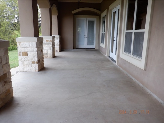 view of terrace featuring french doors