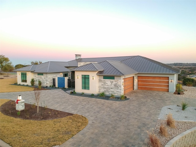 view of front of property featuring a garage