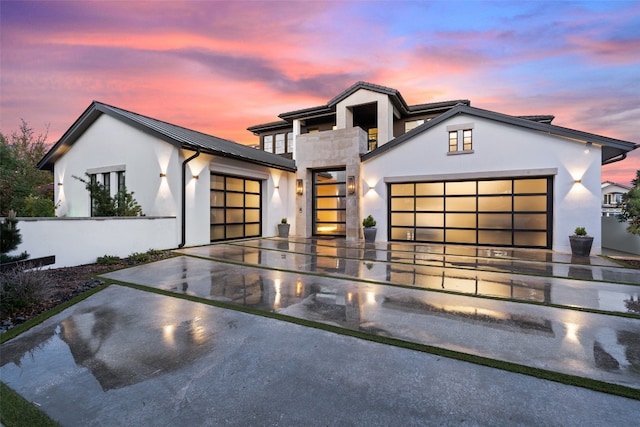 contemporary home featuring a garage