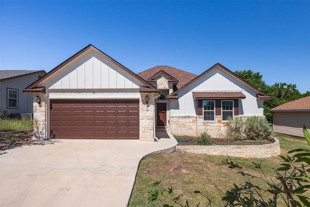 view of front of property featuring a garage