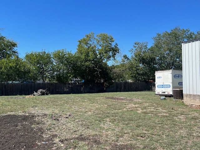 view of yard featuring central AC