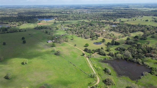 188 Zindler Ln, Paige, TX 78659 - drone / aerial view featuring a water view