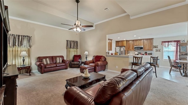 188 Zindler Ln, Paige, TX 78659 - living room featuring light tile flooring, ceiling fan, and crown molding