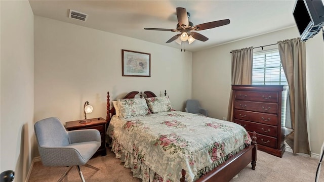188 Zindler Ln, Paige, TX 78659 - bedroom with ceiling fan and light carpet
