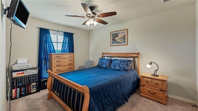 188 Zindler Ln, Paige, TX 78659 - bedroom featuring ceiling fan and light colored carpet