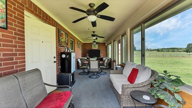 188 Zindler Ln, Paige, TX 78659 - sunroom / solarium featuring ceiling fan