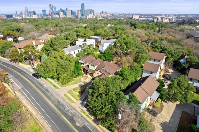 birds eye view of property with a city view