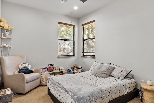 bedroom featuring recessed lighting, ceiling fan, and light colored carpet