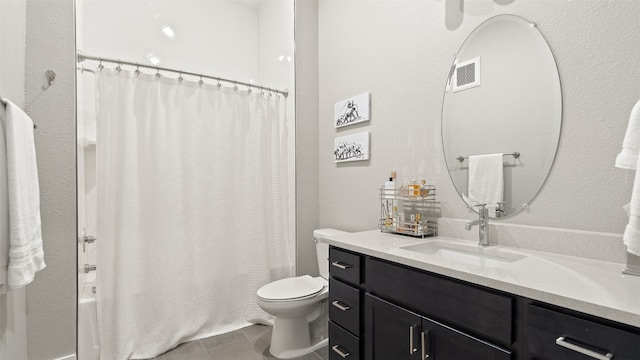 full bathroom with tile patterned flooring, vanity, toilet, and shower / tub combo