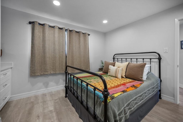 bedroom with light wood-type flooring