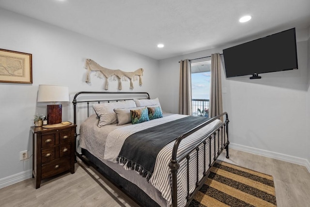 bedroom with light hardwood / wood-style flooring