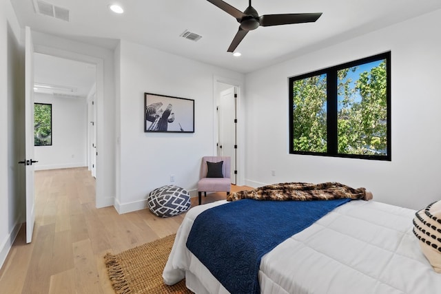 bedroom featuring ceiling fan and light wood-type flooring