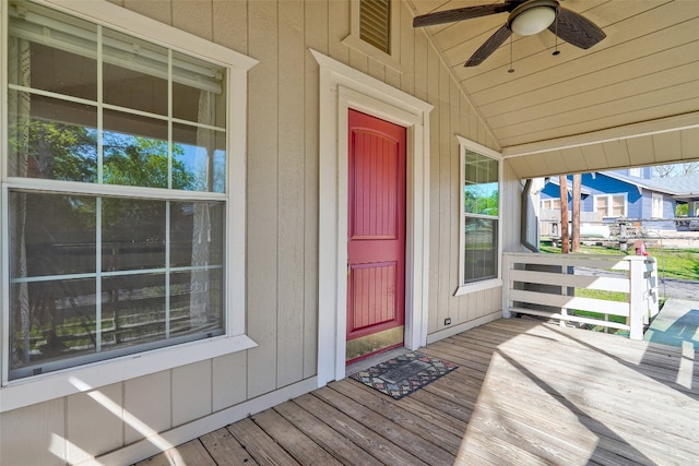 view of exterior entry with ceiling fan