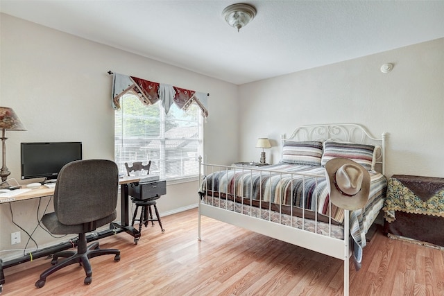 bedroom featuring light hardwood / wood-style floors