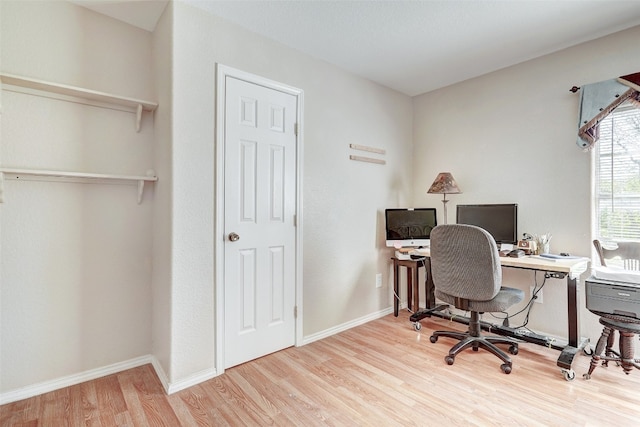 office space featuring light wood-type flooring