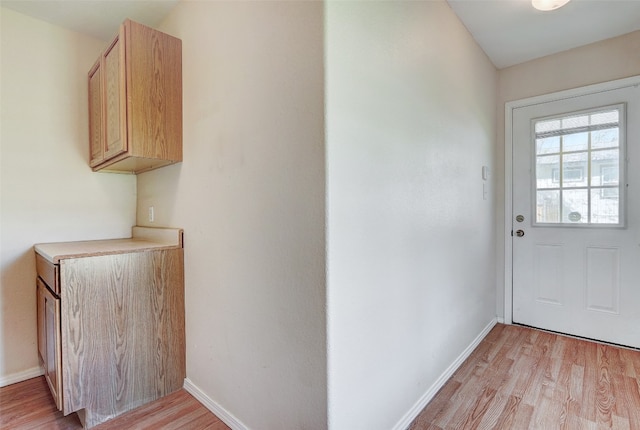 doorway featuring light hardwood / wood-style flooring