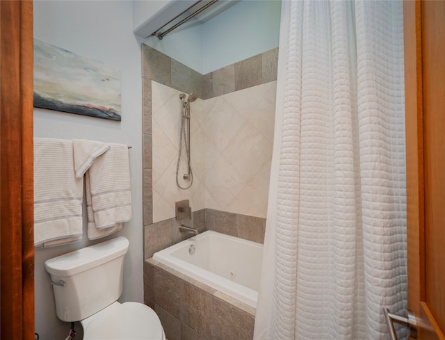 bathroom with shower / tub combo with curtain and toilet