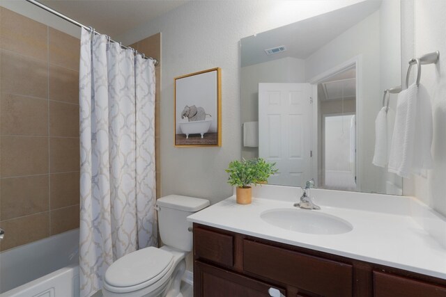 full bathroom with shower / tub combo with curtain, oversized vanity, and toilet