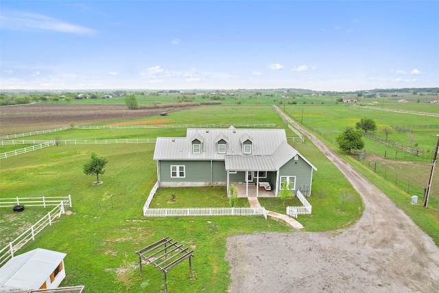 birds eye view of property featuring a rural view