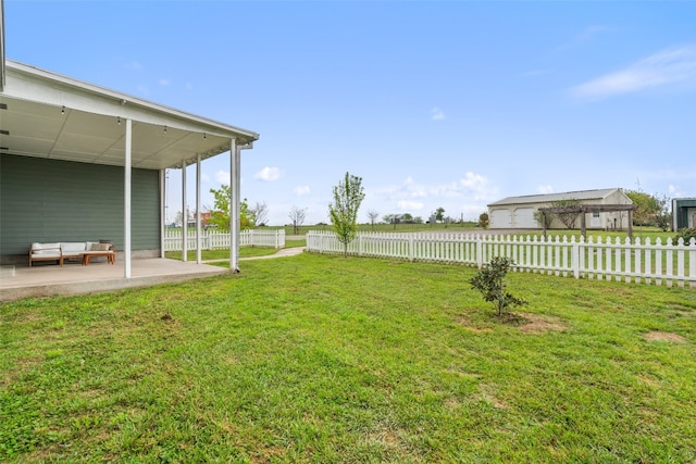 view of yard featuring an outdoor living space and a patio