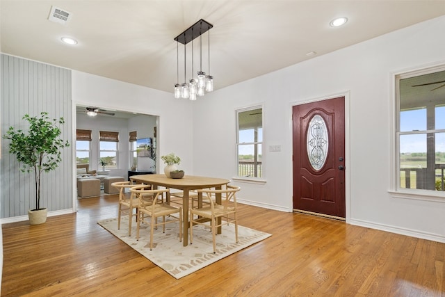 dining room featuring ceiling fan and light hardwood / wood-style floors