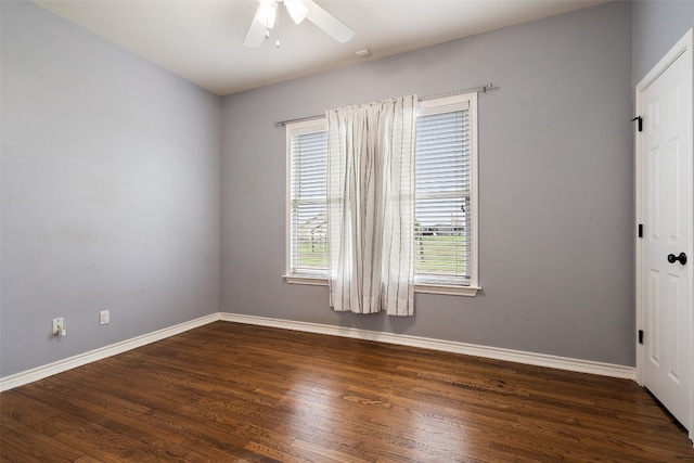 interior space featuring ceiling fan and dark hardwood / wood-style flooring