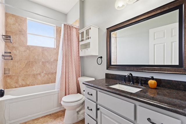 full bathroom featuring tile patterned flooring, toilet, shower / tub combo with curtain, and vanity