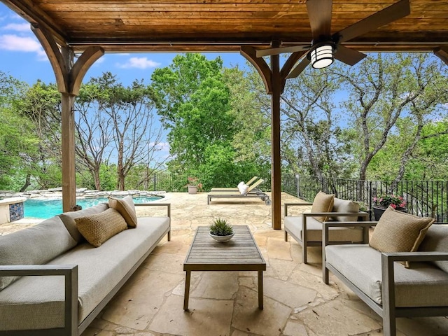 view of terrace with outdoor lounge area and a fenced in pool