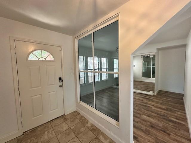 entrance foyer with hardwood / wood-style floors